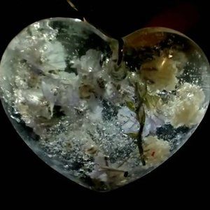 Flower embedded pendant